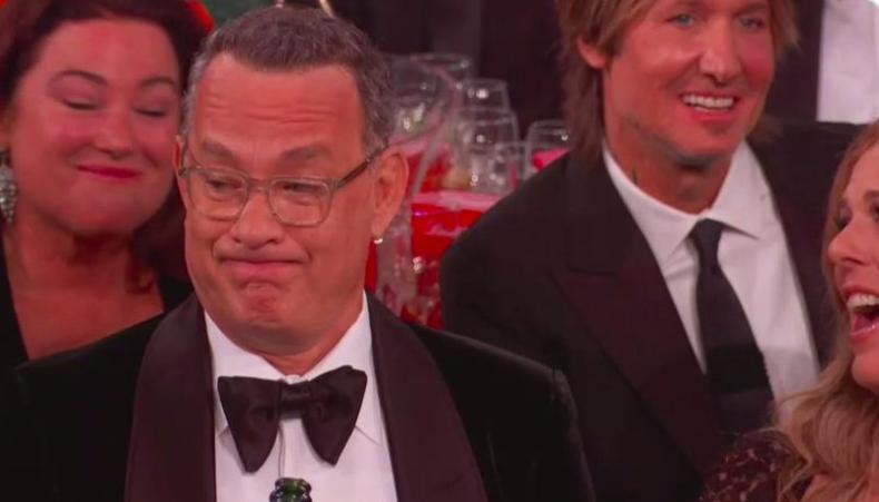 Выражение лица Тома Хэнкса может стать новым интернет-мемом: актер не скрывал эмоции во время выступления Рикки Жерве на 