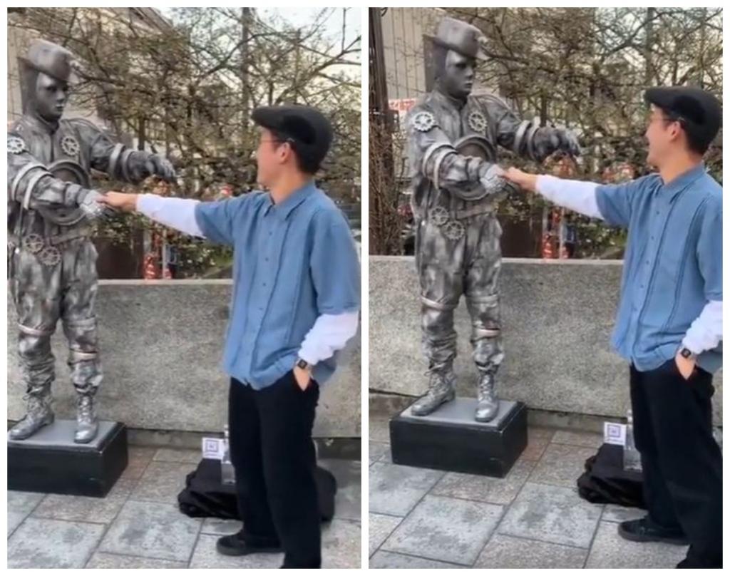 Когда  на одной волне  со статуей: получился забавный дуэт (видео)