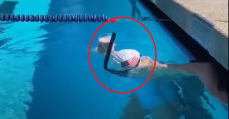 Пятикратная олимпийская чемпионка Кэти Ледеки плывет в бассейне со стаканом на голове: видео